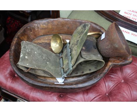 AN ANTIQUE CARVED WOODEN BOWL OR BASIN, a 19th Century cow bell and a brass horn (3)