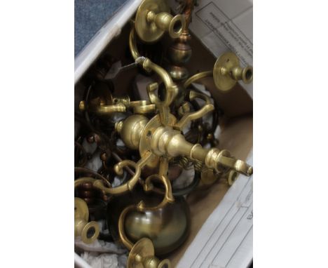 A BRASS SIX BRANCH HANGING LIGHT FITTING with scrolling branches and finial decoration 45cm wide together with a further ligh