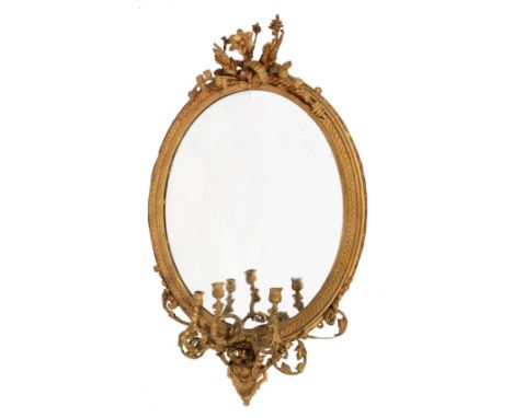 A VICTORIAN GILT GESSO OVAL GIRANDOLE HANGING WALL MIRROR with three acanthus scroll candle holders and foliate finial, 120cm