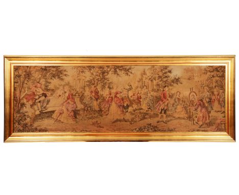 A CONTINENTAL MACHINE MADE TAPESTRY depicting figures and musicians in a garden with classical ruins, in a gilt frame, 61cm x