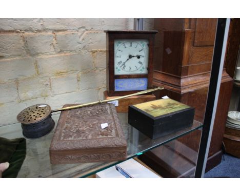 A 19TH CENTURY BRASS CHESTNUT ROASTER a carved Indian hardwood box, an Anchor sewing cotton reel box with marine print to the