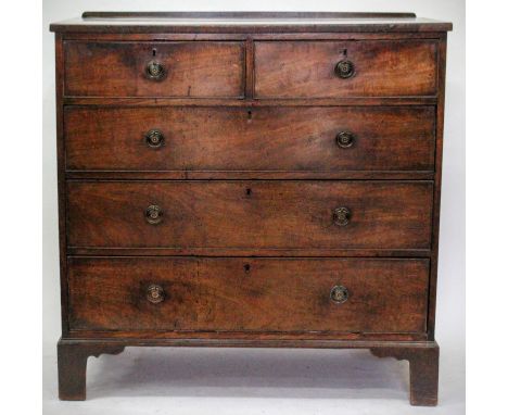 AN EARLY VICTORIAN MAHOGANY CHEST of two short and three long drawers with brass ring handles and bracket feet 102cm wide 