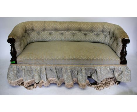 A LATE VICTORIAN SMALL OAK FRAMED SETTEE with pale blue button back upholstery, turned and carved arms and turned legs with c