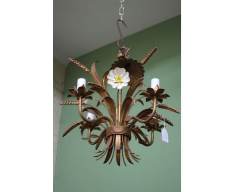 A TOLEWARE FRENCH GILT METAL FOUR BRANCH HANGING WALL LIGHT stylised with flowers and corn 48cm in height