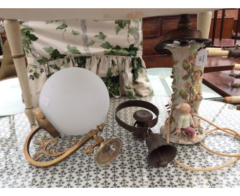 A GILT METAL ELECTRIC WALL LIGHT with a frosted glass, spherical shade, a servants bell and a continental pottery lamp (3)