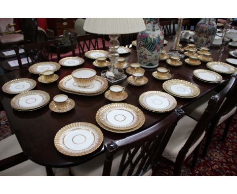 AN EARLY 19TH CENTURY ENGLISH PORCELAIN PART TEA AND DINNER SERVICE with geometrical decoration 