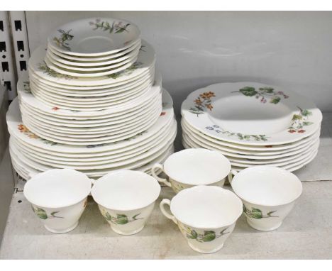 MINTON; a part tea and dinner service decorated in the 'Meadows' pattern, comprising eleven dinner plates, nine side plates, 