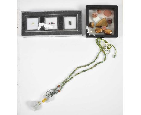 A cased set of gemstones, also another cased set of semi-precious stones, and a Chinese style white and green jade type neckl