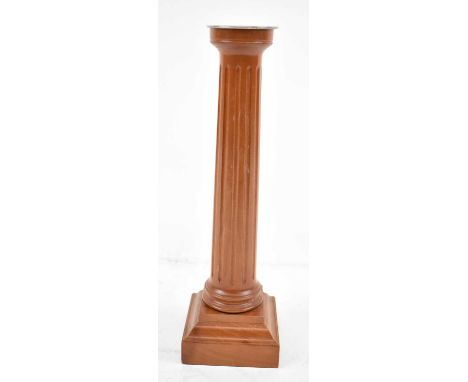 DAVID LINLEY; a modern fluted column candlestick with white metal mount to top, inscribed 'Linley' to the front, height 30cm.