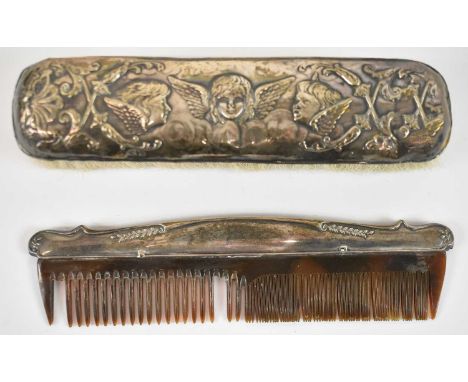 An Edward VII hallmarked silver dressing table brush decorated with Reynolds angels, Birmingham 1905, together with a hallmar