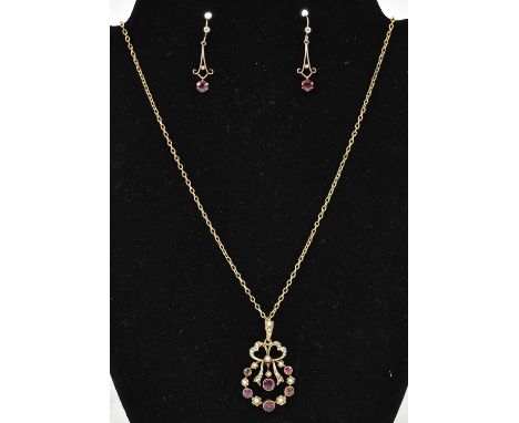 An Edwardian 9ct yellow gold ruby and pearl set pendant, suspended on yellow metal chain, with pair of matching ruby and pear