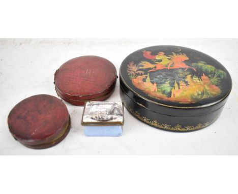Two leather cased portrait miniatures painted on card, together with a circular lacquered box, with decoration of man riding 