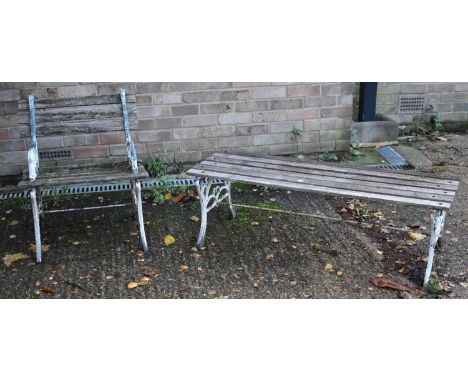 A garden chair with slatted wooden seat and a similar table/bench.