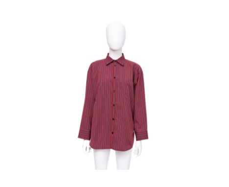 A BALENCIAGA OVERSIZED BUTTON-UP SHIRT
Vertical multicolor stripe pattern, with point collar, long sleeves with buttoned cuff