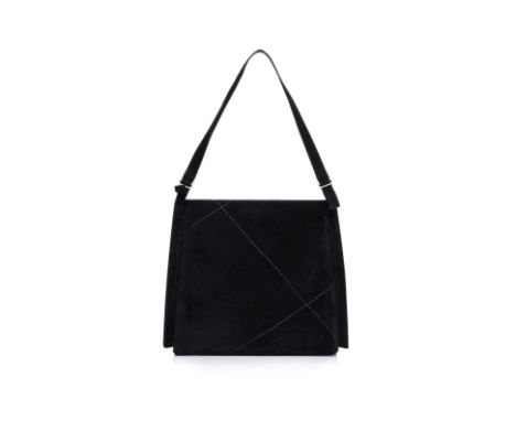 A SALVATORE FERRAGAMO BLACK SUEDE TOTE
Silver-tone hardware, a single shoulder strap, and a snap closure at the top, interior