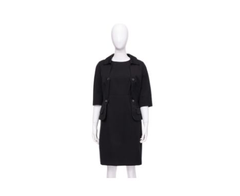 A JIL SANDER CONVERTIBLE BLACK DRESS
Designed with an integrated cropped jacket featuring a notched collar, front button clos