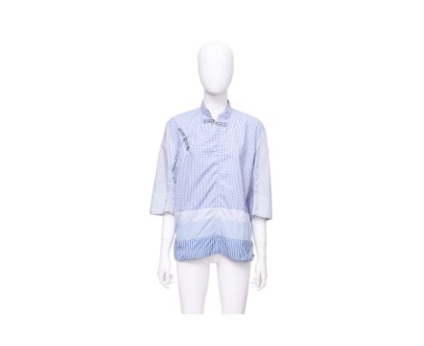 A TAO COMME DES GARCON 3/4 SLEEVE SHIRT
Constructed from mixed gingham and striped cotton panels, featuring a mandarin collar
