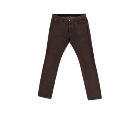 A PAIR OF LOUIS VUITTON BROWN DENIM PANTS
With a straight-leg cut, and a 'Gaston' leather patch at the back pocket
Size XL
Ow