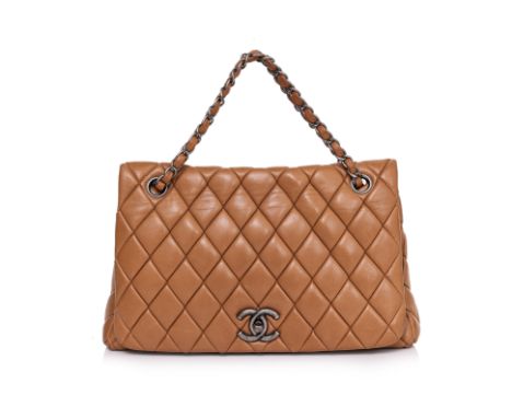 A CHANEL QUILTED LAMBSKIN BUBBLE FLAP BAG
Featuring exaggerated diamond quilting, antiqued hardware and a CC turn-lock fasten