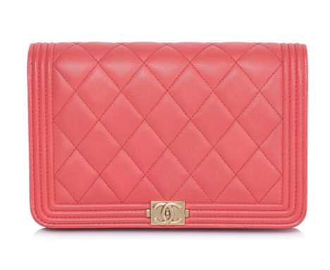 A CHANEL QUILTED CORAL BOY WALLET ON CHAIN
Lambskin leather, featuring a front flap with interlocking CC button-clasp, gold-t