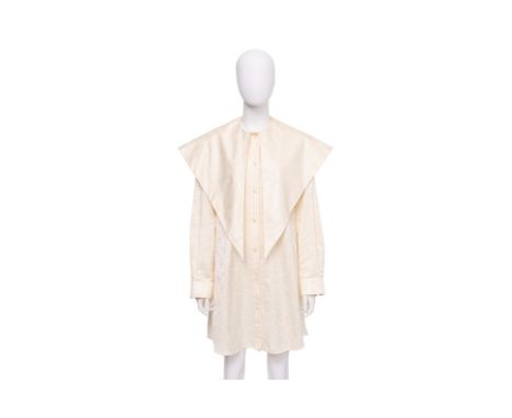 A SIMONE ROCHA OVERSIZED-COLLAR SHIRT DRESS
Ivory jacquard floral shirt with an exaggerated collar, button front closure, and