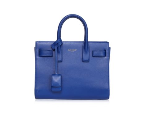 A SAINT LAURENT COBALT BLUE SAC DE JOUR NANO
Rolled top handles, an adjustable and detachable shoulder strap, accordion sides