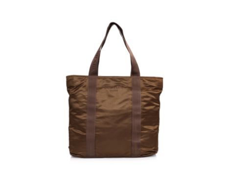 A PRADA TESSUTO NYLON TOTE BAG
Olive green nylon with tonal webbing trim, dual flat shoulder straps with reinforced stitching