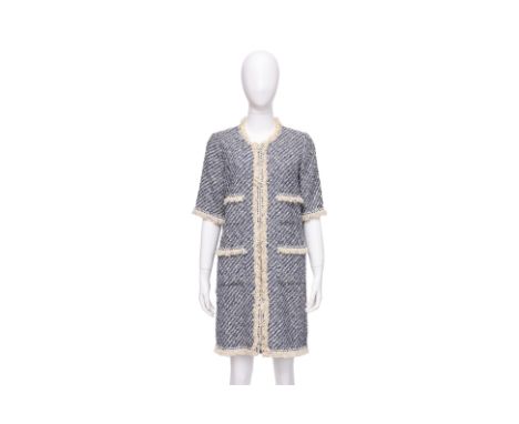 A LOUIS VUITTON TWEED COAT DRESS
WIth contrast frayed trim, short sleeves, and four front patch pockets
From 2014 Resort coll