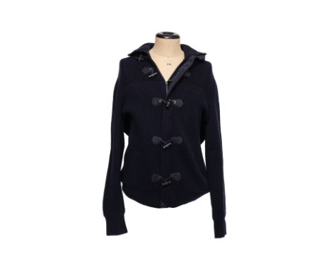 A BERLUTI CASHMERE KNIT CARDIGAN
Featuring toggle closures with goatskin leather detailing and a concealed zip closure
Size 5