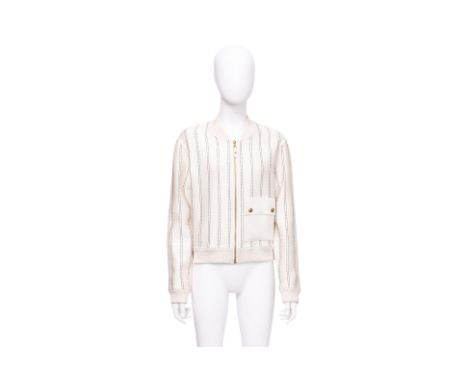 A LOUIS VUITTON STRIPED KNIT BOMBER JACKET
With a gold-tone zip hardware, contrast patch pocket with snap buttons, and ribbed