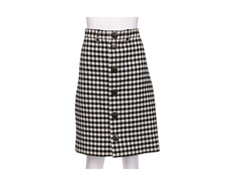 A BALENCIAGA VICHY GINGHAM PENCIL SKIRT
Constructed from heavyweight fabric for a structured silhouette, featuring a black an
