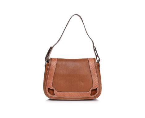 A CARTIER MARCELLO DE CARTIER SADDLE BAG
Tan leather with contrasting snakeskin trim, single adjustable shoulder strap with s