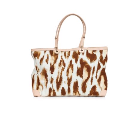 A CHRISTIAN DIOR ST. TROPEZ TOTE BAG BY JOHN GALLIANO Leopard print canvas body with leather trim, a front exterior zip pocke