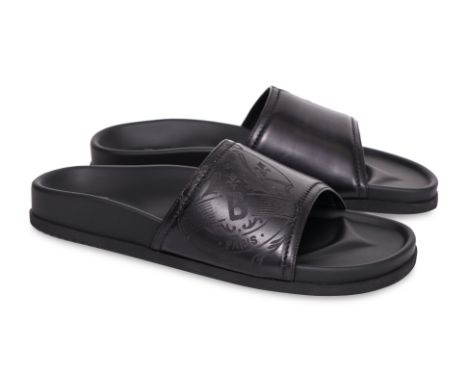 A PAIR OF BERLUTI EGIO STAMP LEATHER SANDALS
With  embossed crest detail, molded footbed, and rubber outsole
Size 240
Ownersh