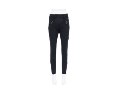 A LOUIS VUITTON BLACK PANTS BY NICOLAS GHESQUIÈRE
High-waisted with zippered front pockets, ankle zips, and belt loops
From 2