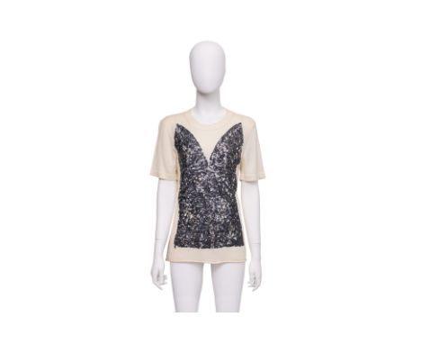 A LOUIS VUITTON SEQUINED KNIT TOP BY NICOLAS GHESQUIÈRE
Trompe l’oeil sequined bustier motif on a knit jersey base, ribbed cr