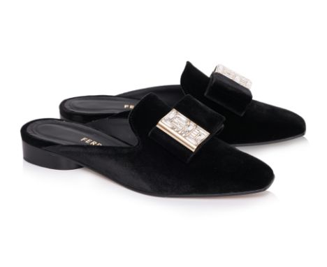 A PAIR OF SALVATORE FERRAGAMO 'LEA' BLACK MULES
Velvet upper, bow detail with crystal-embellished accents, pointed toe, low h