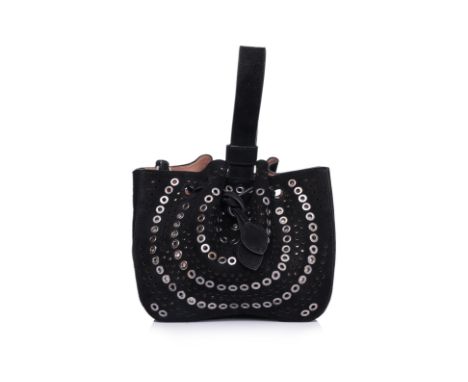 AN ALAIA BLACK SUEDE WRISTLET BAG
Silver-tone eyelets punctuated throughout, drawstring closure, leather lining, accompanied 