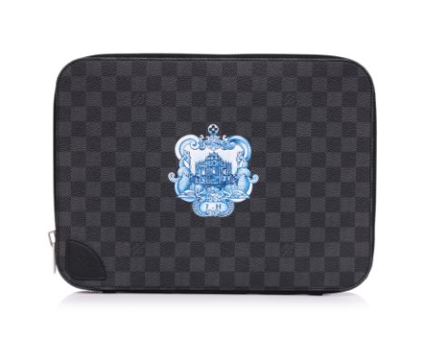 A LOUIS VUITTON DAMIER GRAPHITE LAPTOP CASE
Signature Damier canvas in graphite, silver-tone hardware, opens to a fabric line