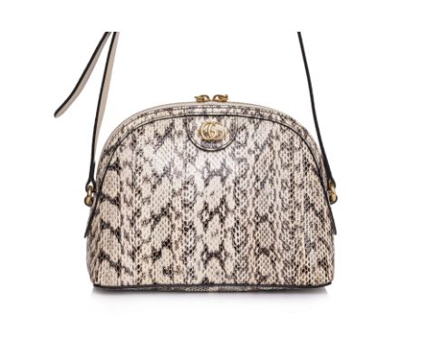 A GUCCI OPHIDIA SNAKESKIN SHOULDER BAG
Accented by a gold-tone 'GG' logo, and hardware, a zip-top closure at the top, an adju