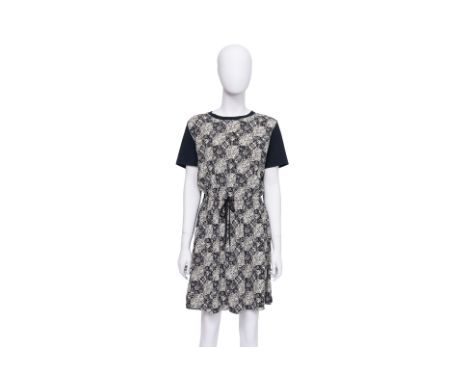 A LOUIS VUITTON MONOGRAM DRAWSTRING DRESS BY NICOLAS GHESQUIÈRE
All-over monogram patchwork print on a silk front panel, cont