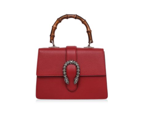 A GUCCI DIONYSUS BAMBOO TOP HANDLE BAG
Red grained leather with bamboo top handle, antiqued silver-tone tiger head spur closu