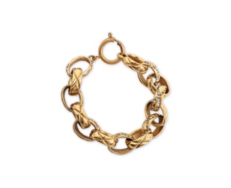 A CHANEL QUILTED CHAINLINK BRACELET
Circa 1984 - 1992, gold-tone chain-link bracelet with quilted detailing, adorned with cry