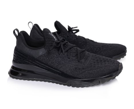 A PAIR OF LOUIS VUITTON BLACK 'V.N.R' SNEAKERS
Technical knit upper, glossy rubber midsole, tonal LV branding at the tongue a