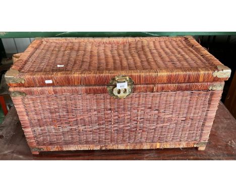 Wicker trunk with brass clasp and corners 