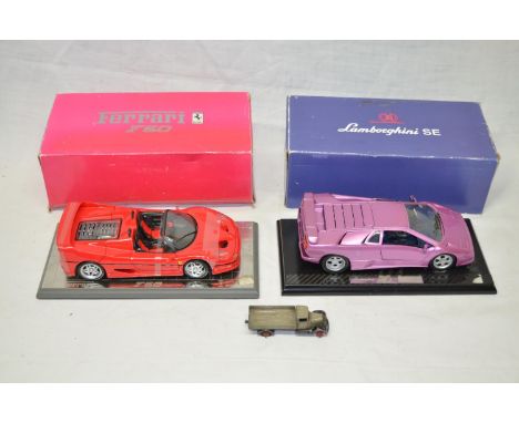 2x 1/18 scale supercar models by GWILO International. One Ferrari F50 with original packaging and certificate of issue on bas