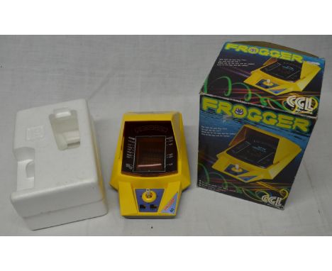 Vintage boxed Frogger game with instructions 