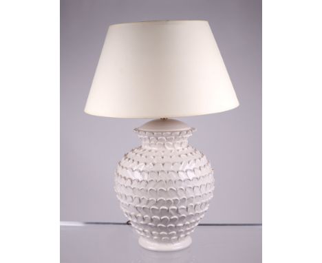 A modern design ceramic table lamp, 41cms high excluding fittings.Condition ReportThe lamp has several chips to the pottery b