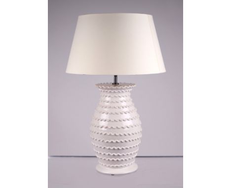 A modern design ceramic table lamp, 37cms high excluding fittings.Condition ReportGood overall condition and lampshade clean