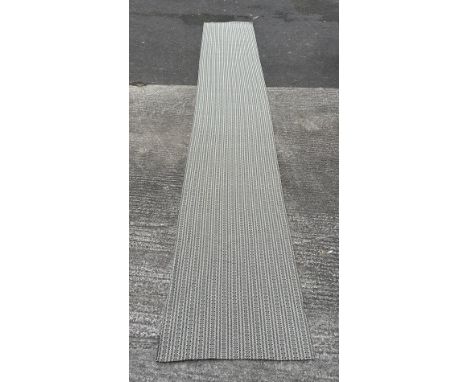 A large modern design runner, 100 y 740cms.